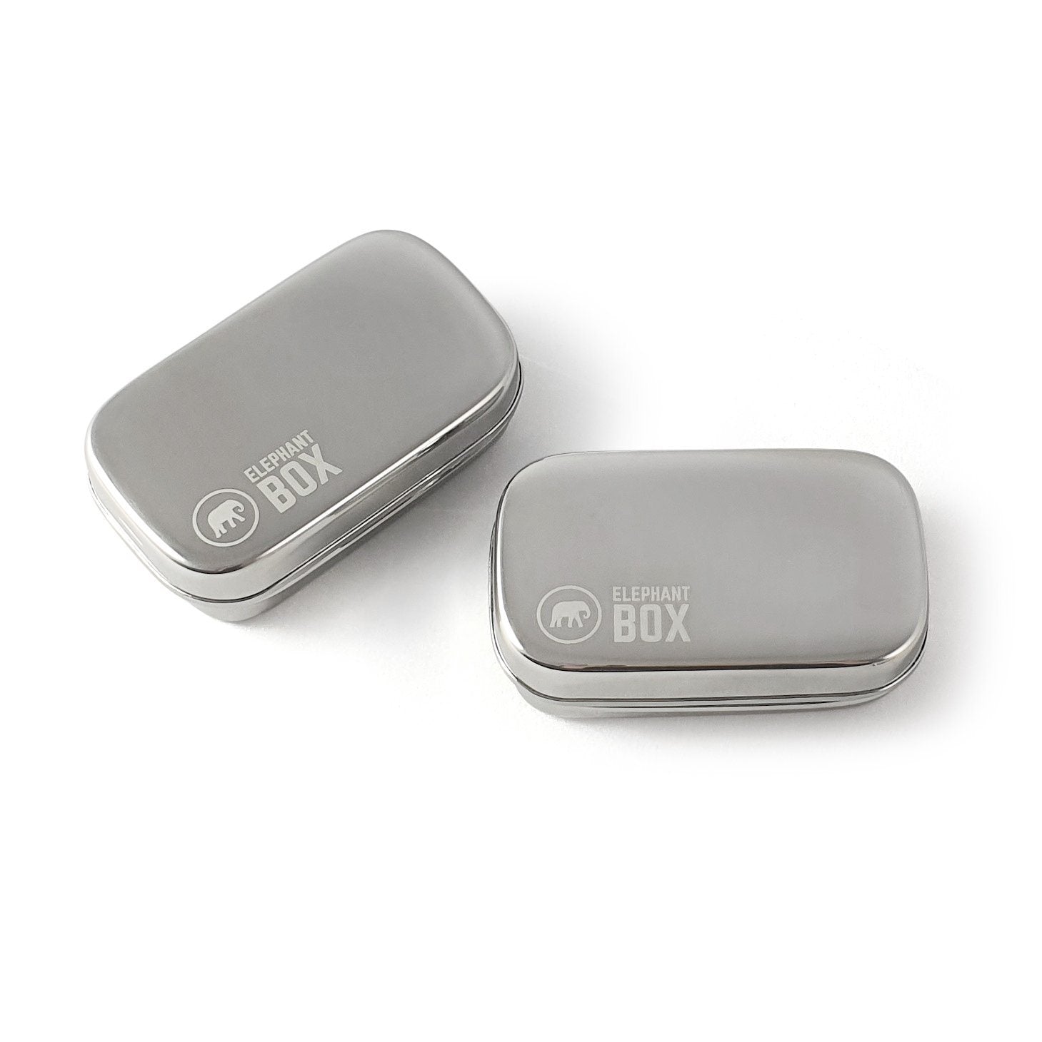 Two silver stainless steel small snack pods with 'Elephant Box' branding on the top.