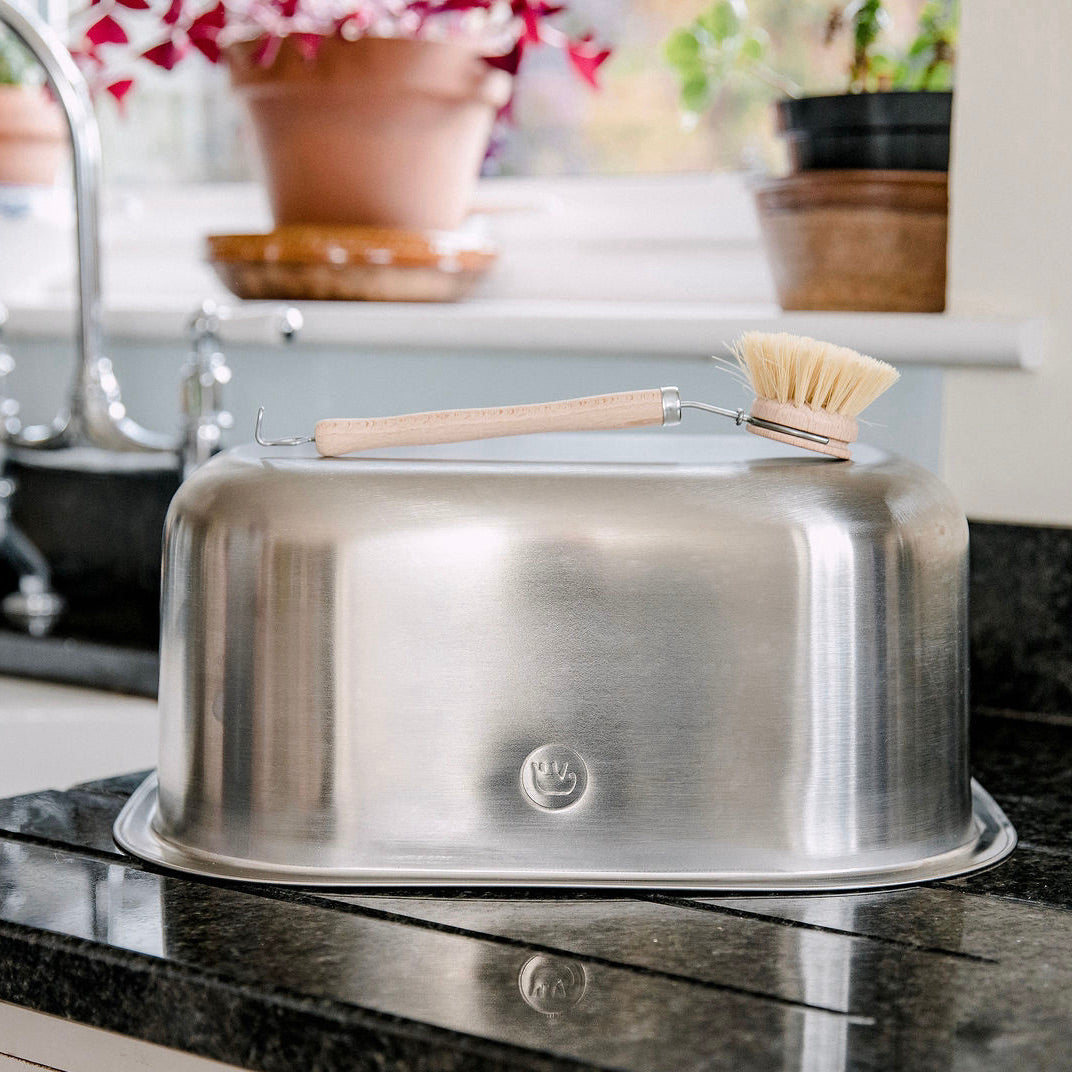 Stainless Steel Washing Up Bowl upside dwn on draining board in a Kitchen Elephant Box