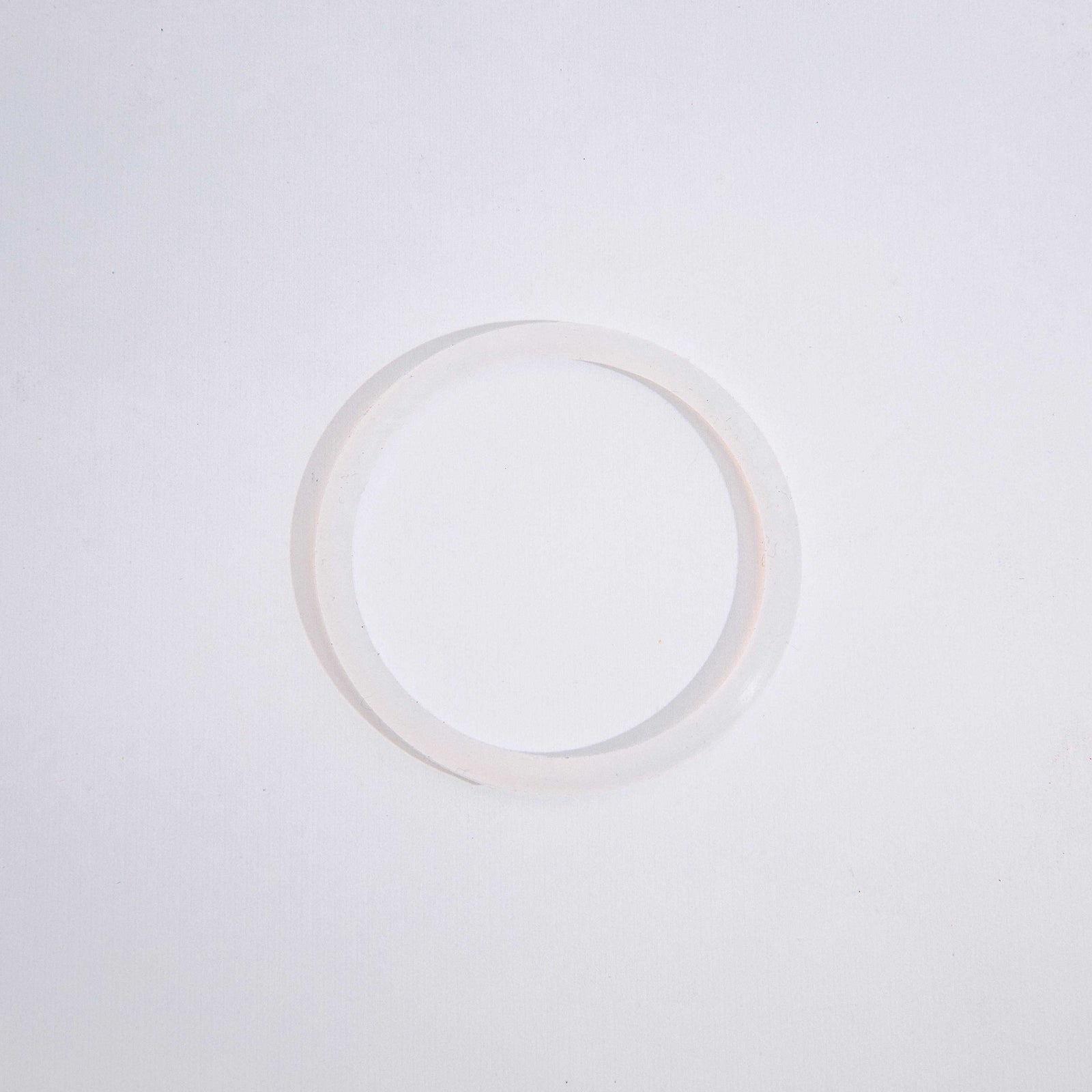 A clear circular silicone seal for a Twist & Lock Canister against a white background.