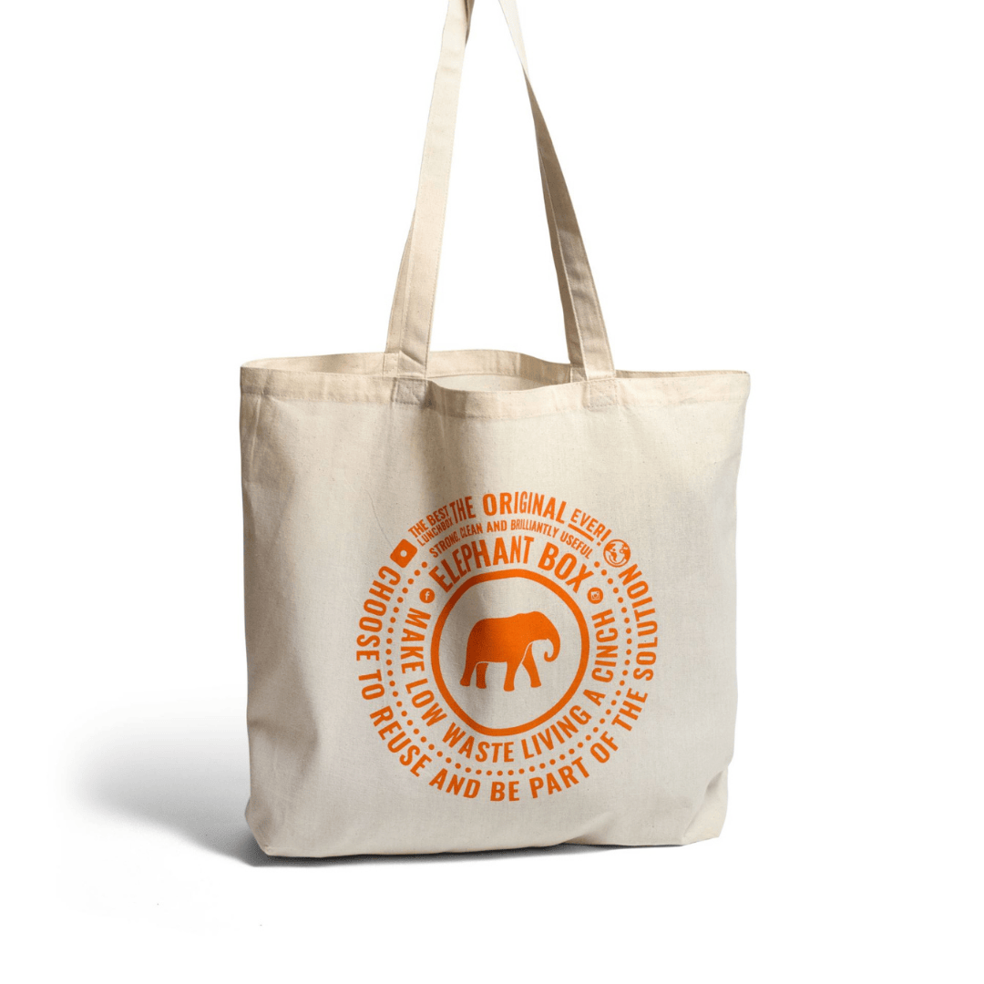 A natural coloured recycled plastic tote bag with orange printed text and an elephant box  graphic on the front.