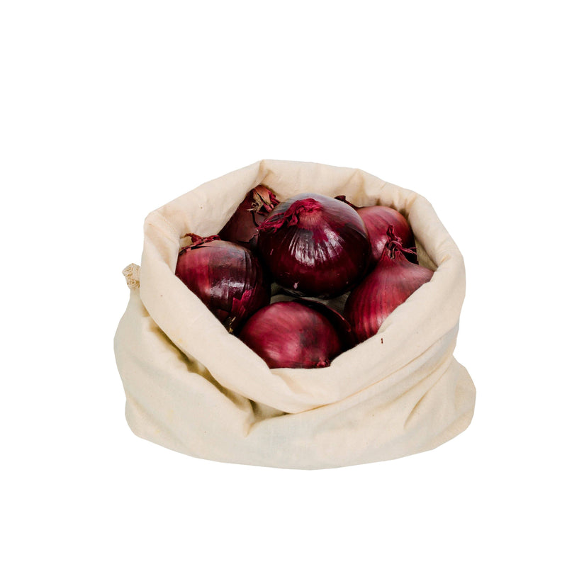 a drawstring cotton produce bag containing lots of red onions